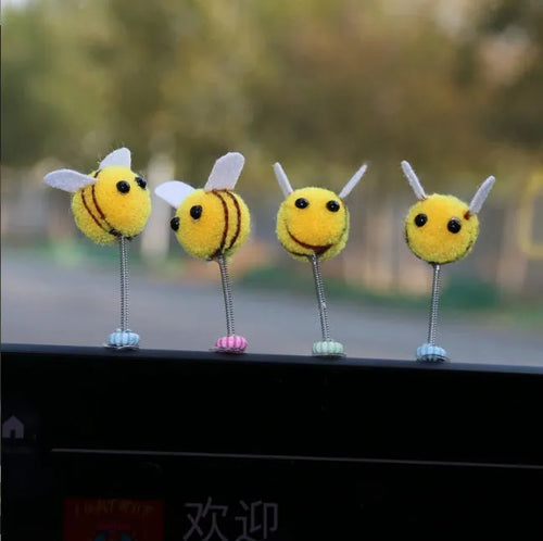 Swing spring bee car decoration made from a fur ball, measuring 3cm by 3cm.