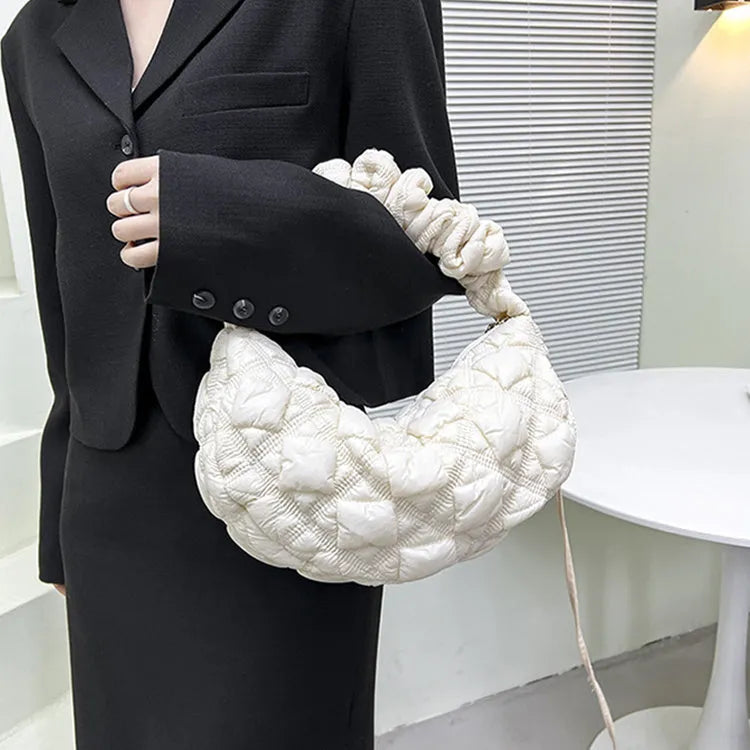 Women's nylon shoulder messenger bag in beige colour showing dimensions and adjustable strap