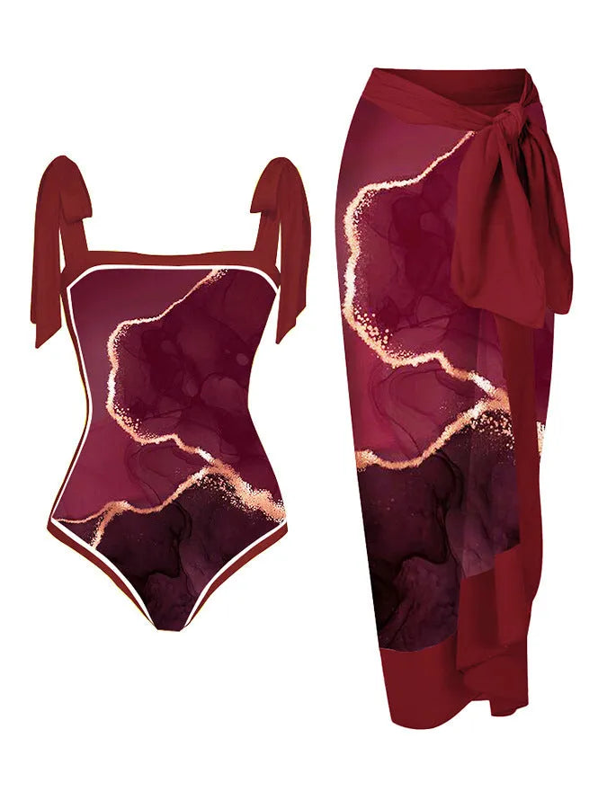 Women's printed chiffon two-piece swimsuit set with a separate hip skirt.