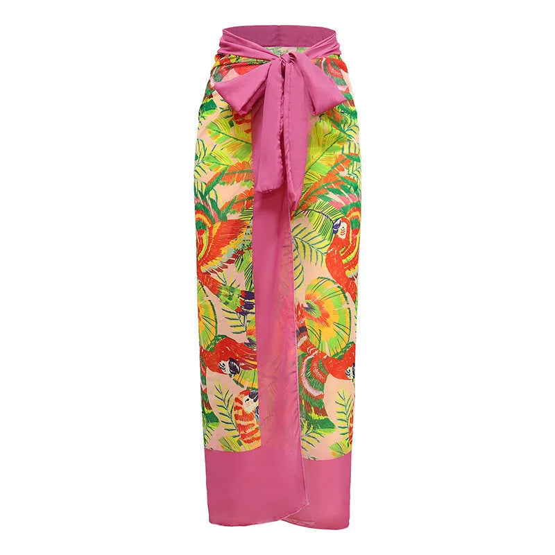 Women's pink floral print one-piece swimsuit with V-neck, covered belly, and attached skirt for swimming