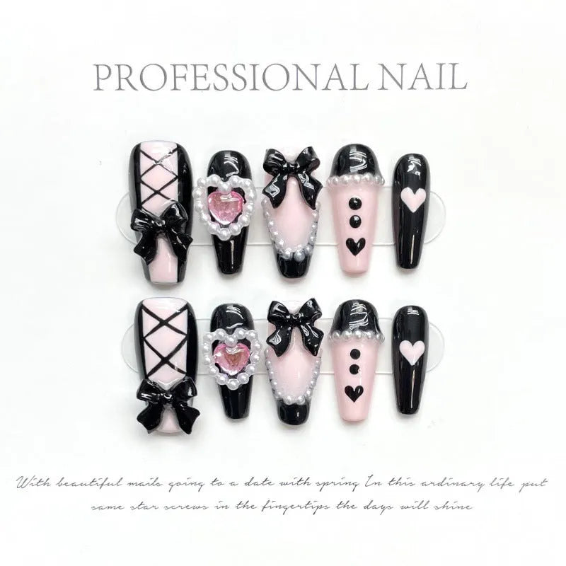 Black peach heart hand-painted cat's eye nail art set with bow patterns on plastic nails