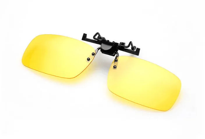 A pair of polycarbonate clip-on sunglasses for prescription glasses, shown in a dark green tint.