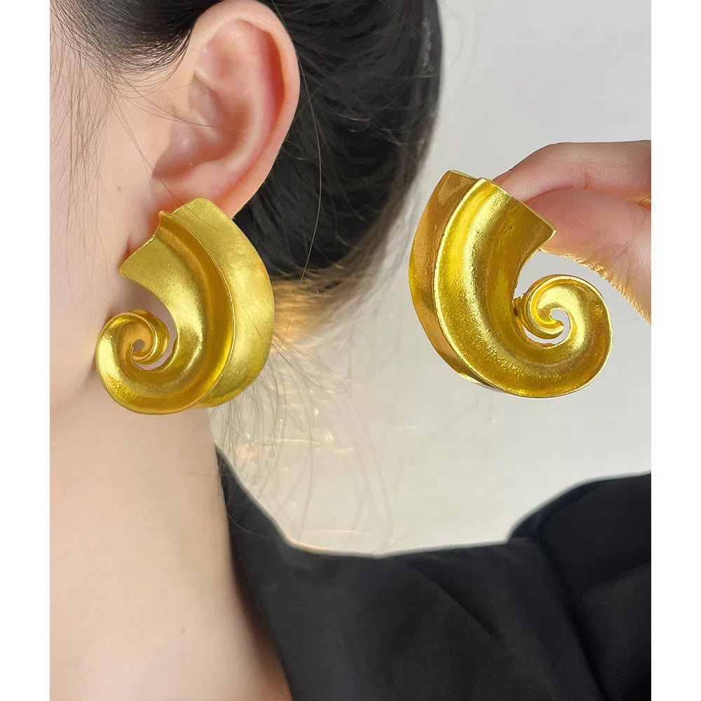 Geometric retro design alloy ear studs in gold or silver colour, 5cm size.