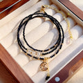 Women's multi-layer bracelet with three interlocking rings featuring blue sand stone details