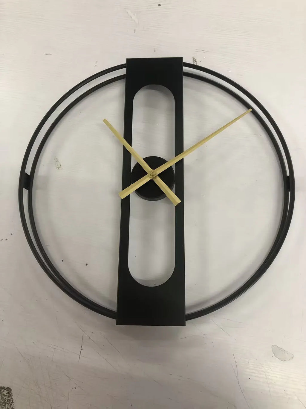 50cm round metal wall clock in black or gold finish with clear hour markers