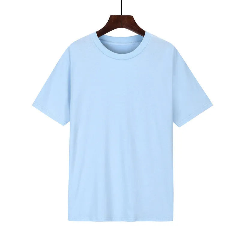 Man wearing a black loose-fit cotton T-shirt, short sleeves, crew neck.
