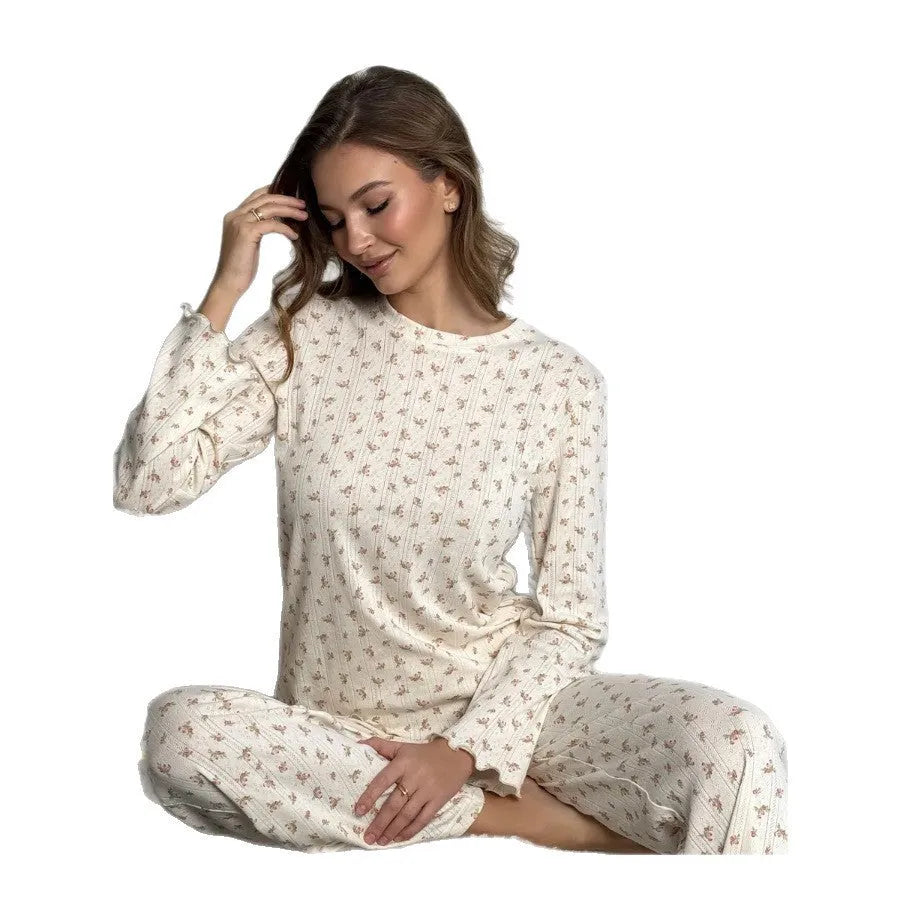 White floral print women's loungewear set with bell sleeve top and wide-leg trousers