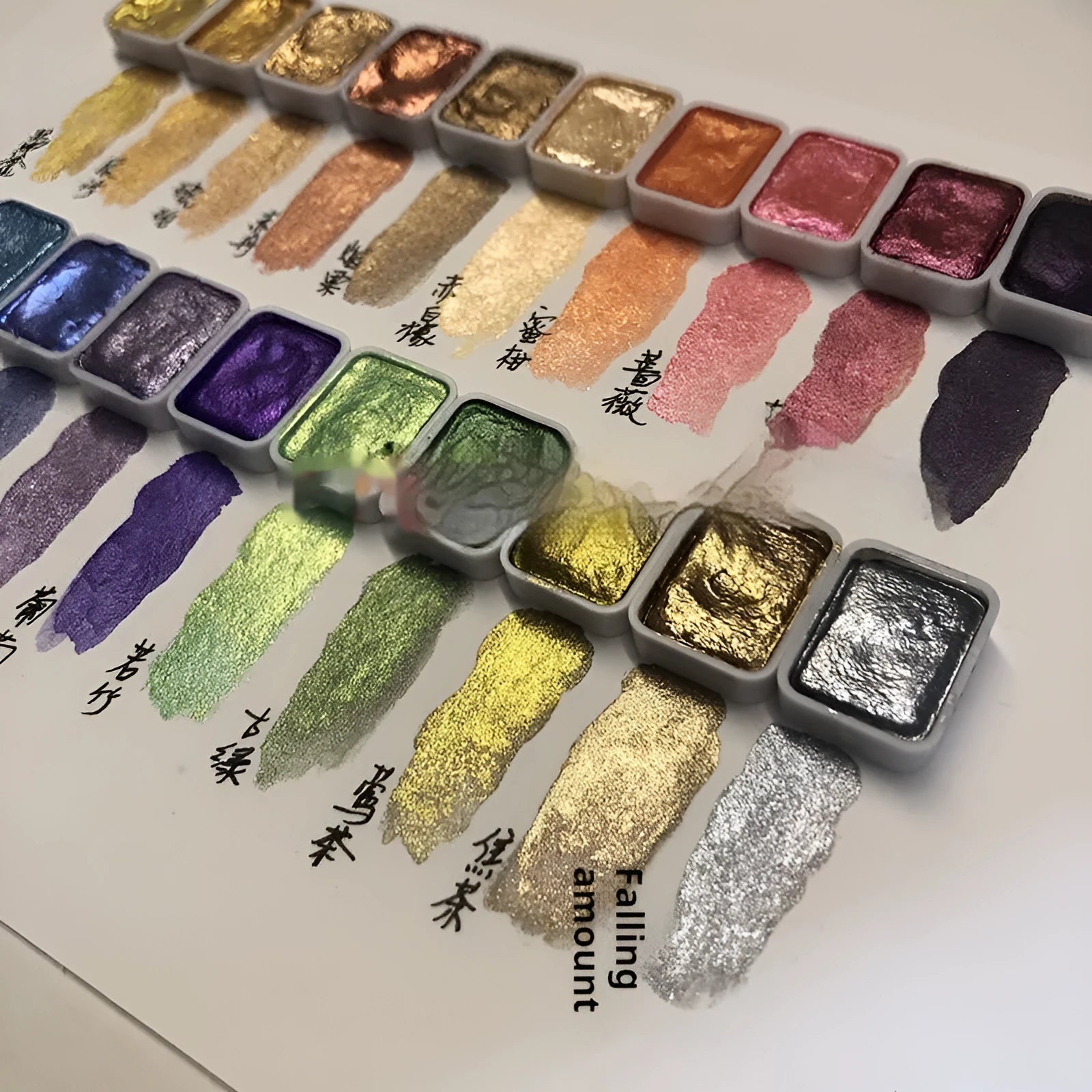 Set of Traditional Chinese painting mineral pearlescent watercolours showing tubes and containers for 20 colours, including gold shades.