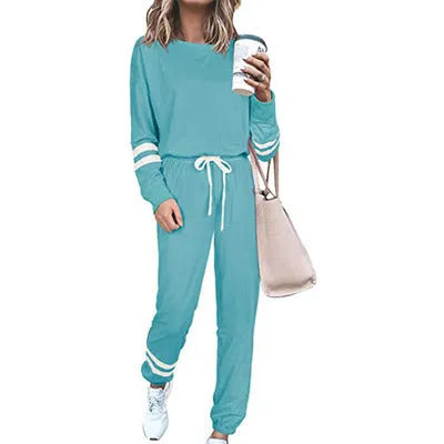 Women's plus size casual suit set with loose-fitting top and trousers in solid colour