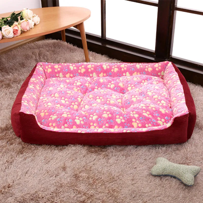 Beige plush bolster dog bed for a small dog, showing raised edges and soft fabric.