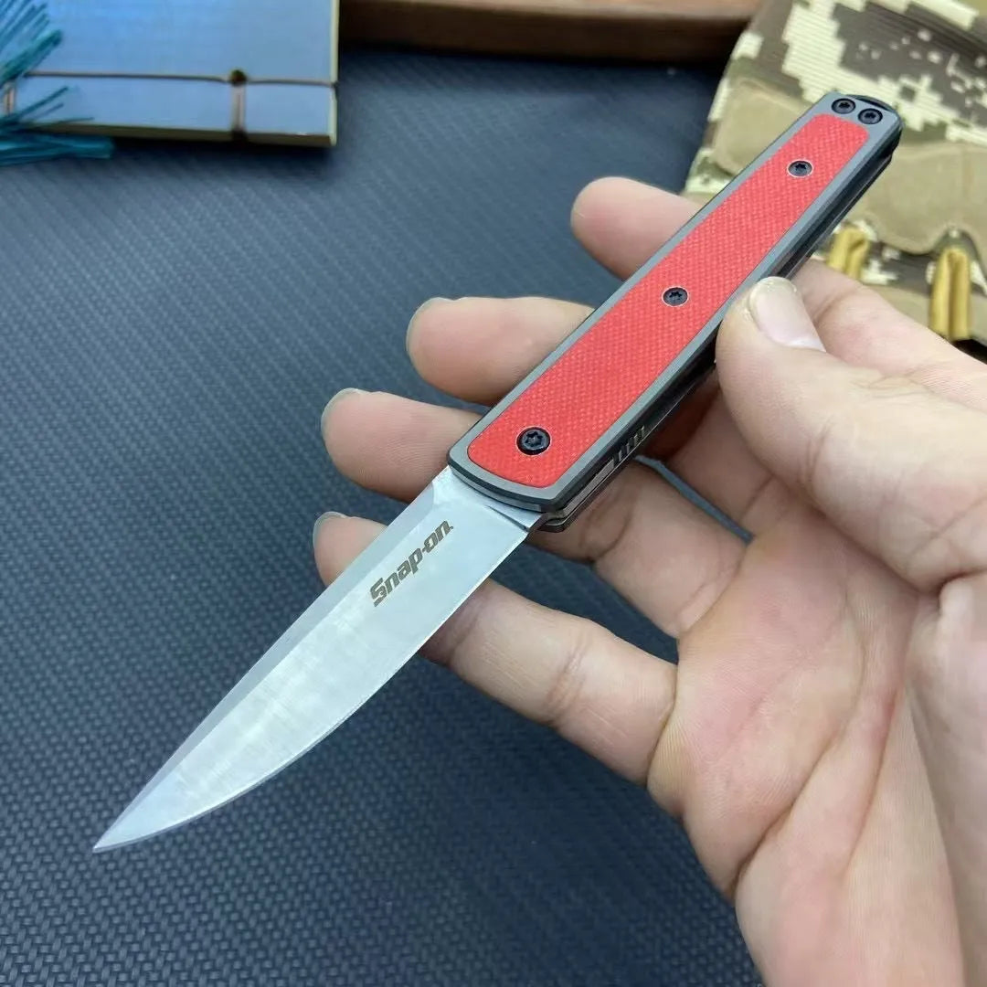 Folding fruit knife with stainless steel blade in black, red or coffee colour options, shown open to 17cm total length