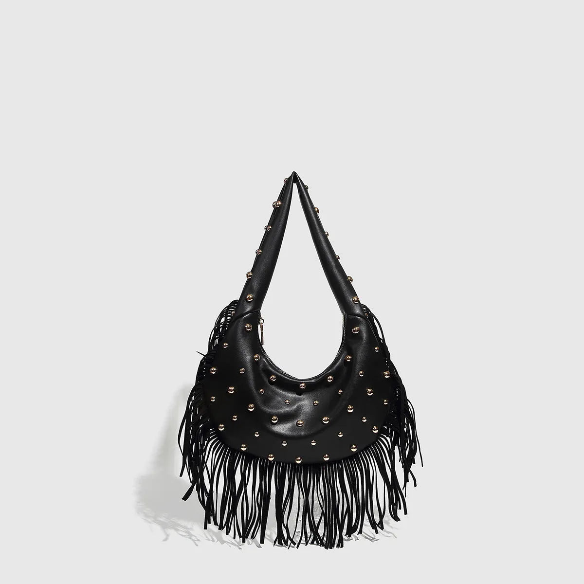 Retro black shoulder handbag with tassel detail showing internal phone compartment