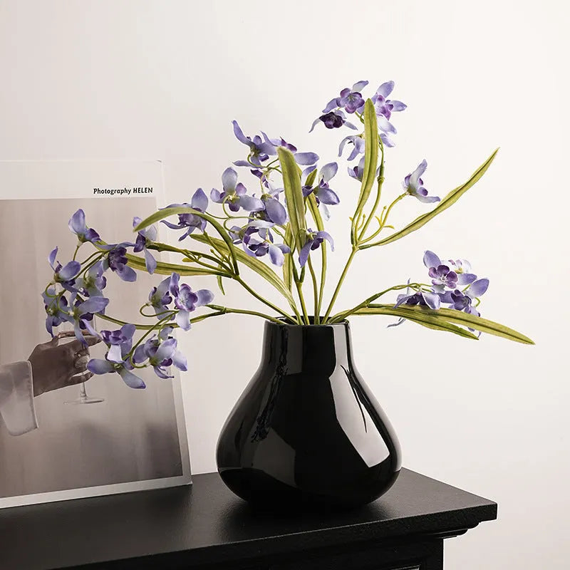 Black and white round belly ceramic decorative vase with optional artificial orchid flowers