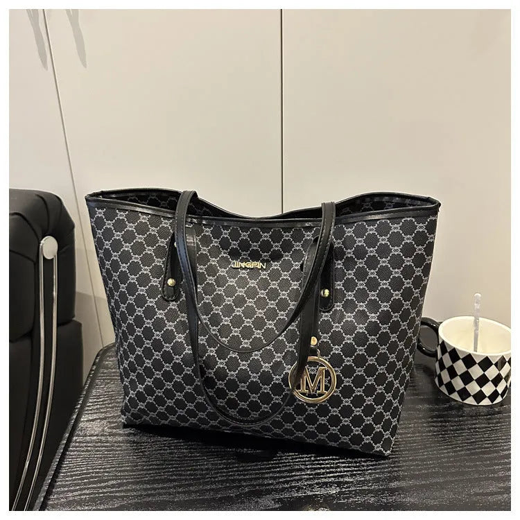 Western style black PU leather shoulder bag with sewing thread details and structured design