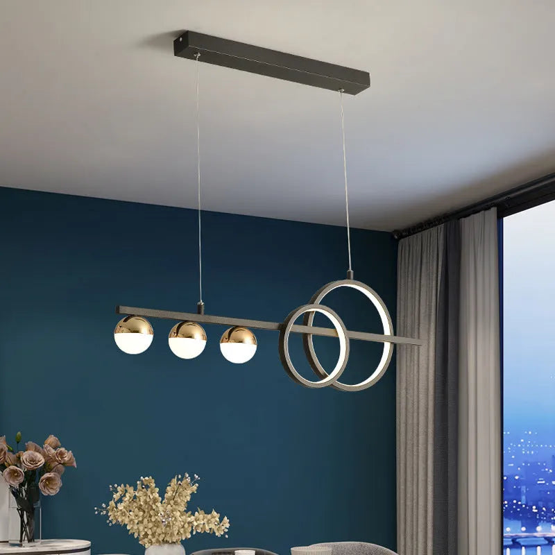 Rectangular aluminium ceiling light in black or gold finish with remote dimming, shown in 80cm, 95cm, and 120cm sizes.