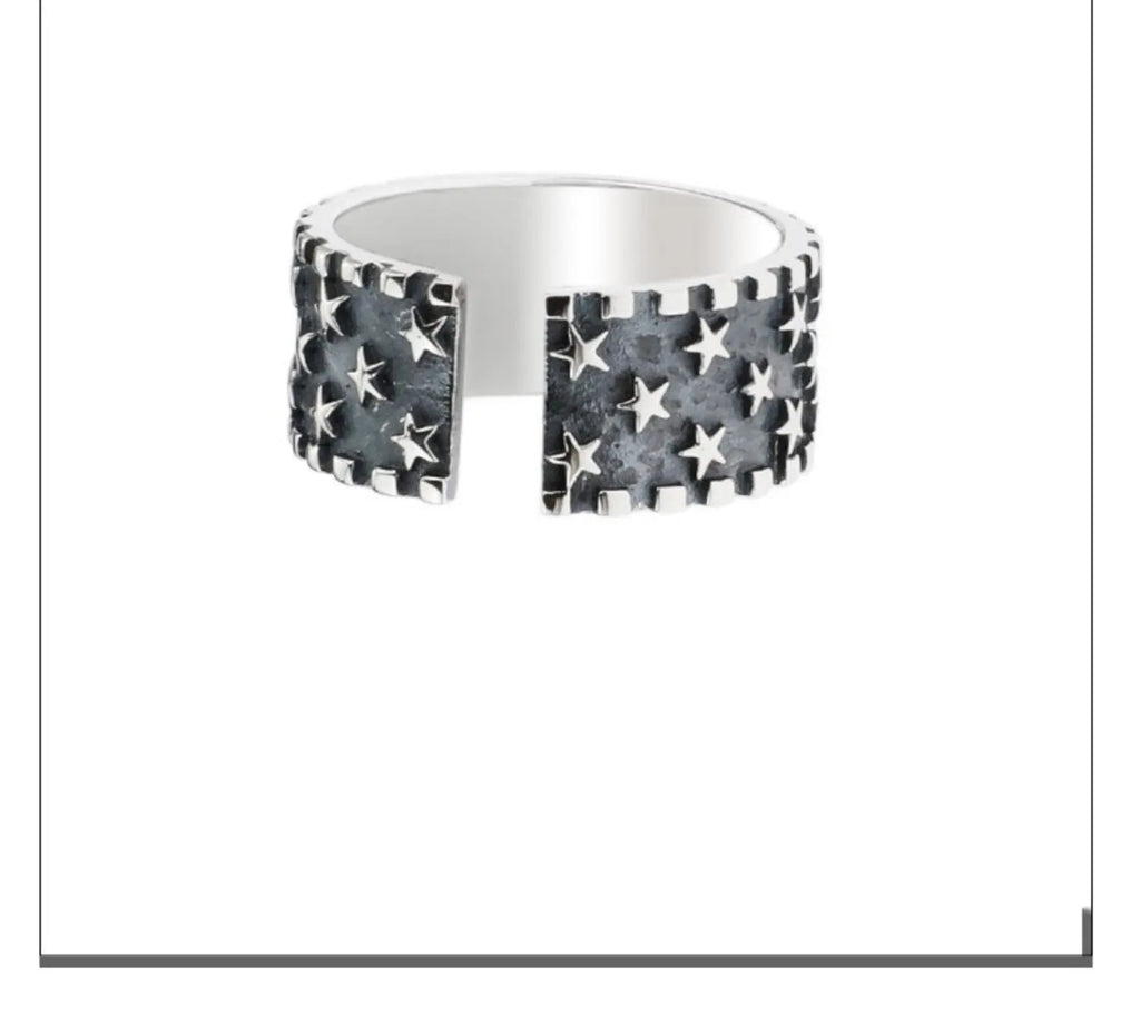 Pure silver multi five-pointed star ring with adjustable opening on a finger