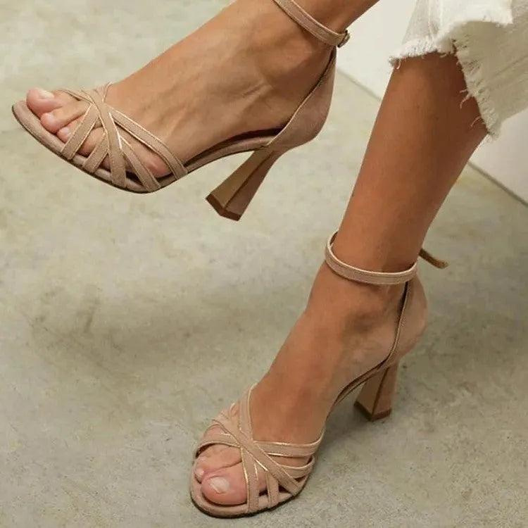 Apricot suede women's high heel sandals with a fish mouth peep toe design on a white background.