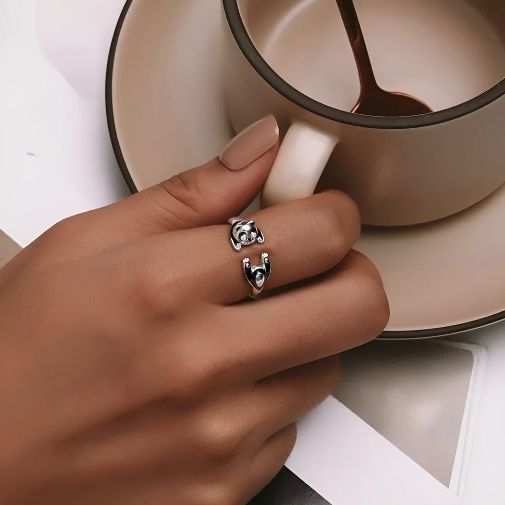 Adjustable sterling silver panda open ring bracelet with white gold plating.