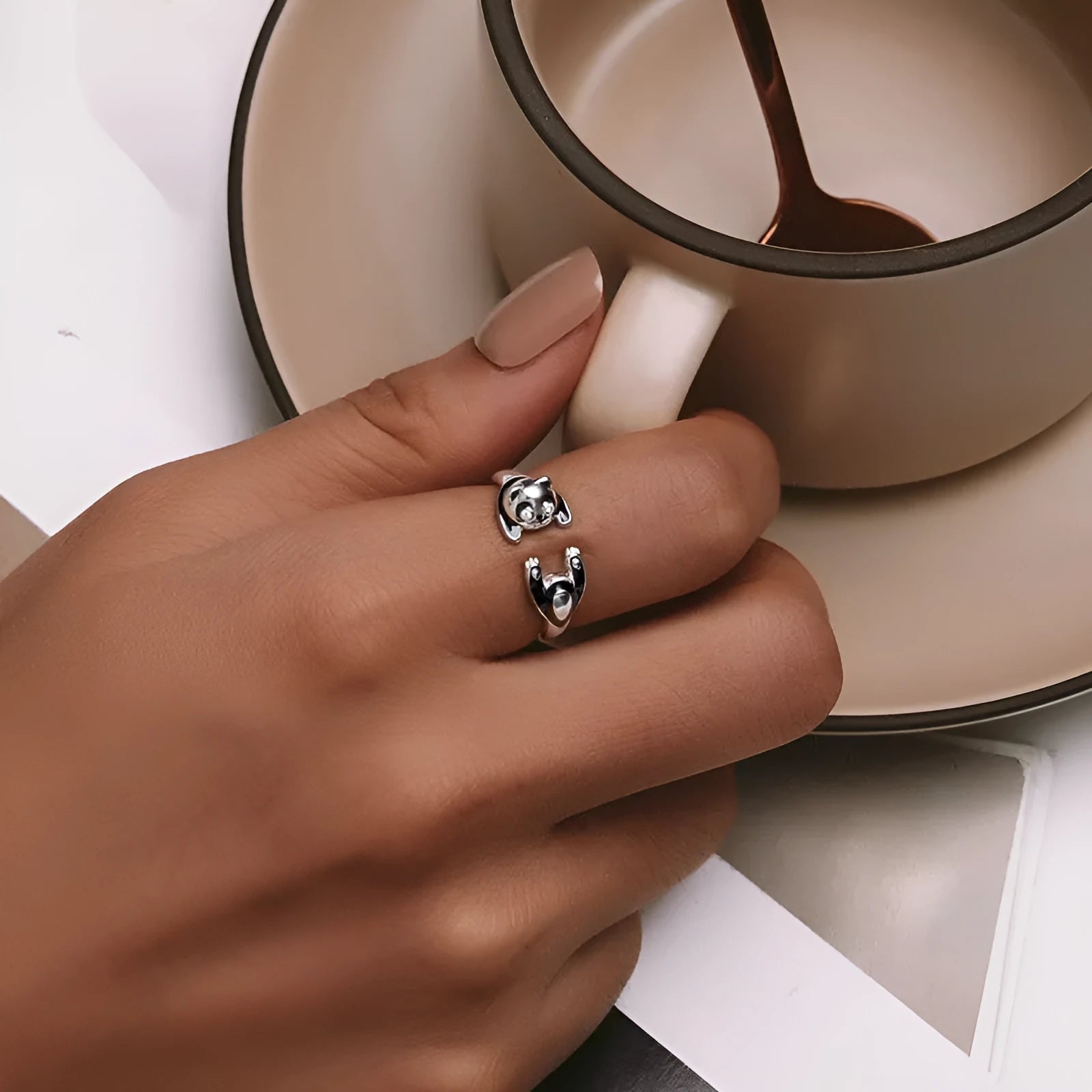 Adjustable sterling silver panda open ring bracelet with white gold plating.