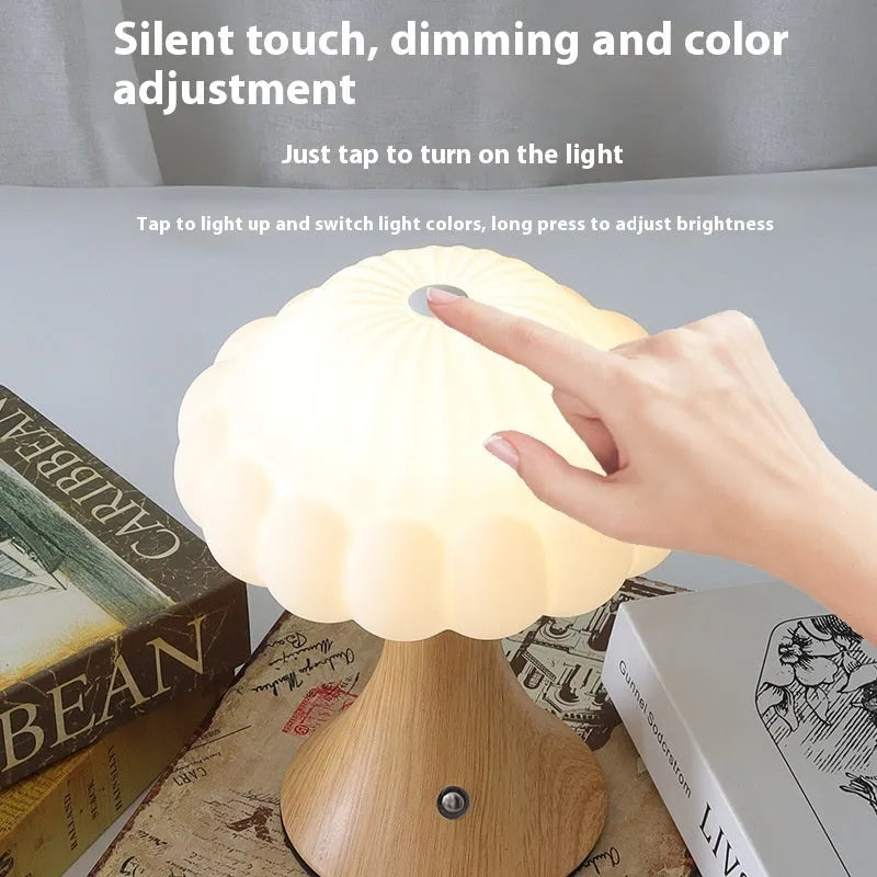 Mushroom-shaped night light with USB charging port and touch controls in five colour options