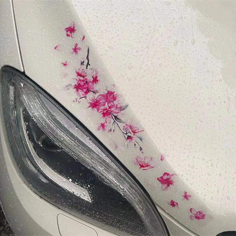 Cherry blossom flower car sticker in small and large size options on a vehicle door.
