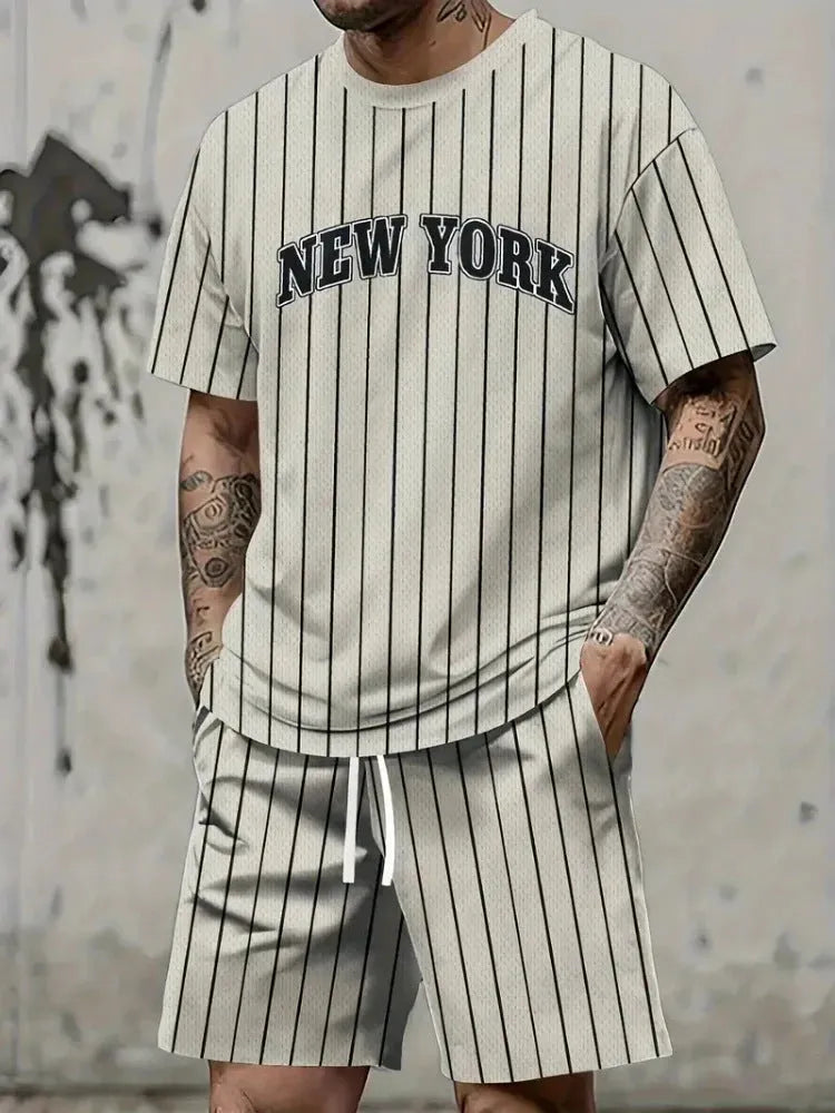 Men's grey 3D printed letter sports suit comprising a short sleeve top and matching shorts