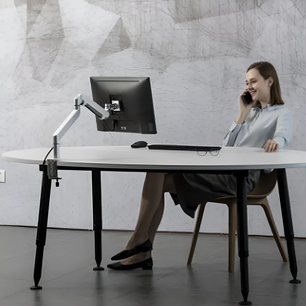 Silver aluminium laptop stand with hover design showing air gap underneath for cooling