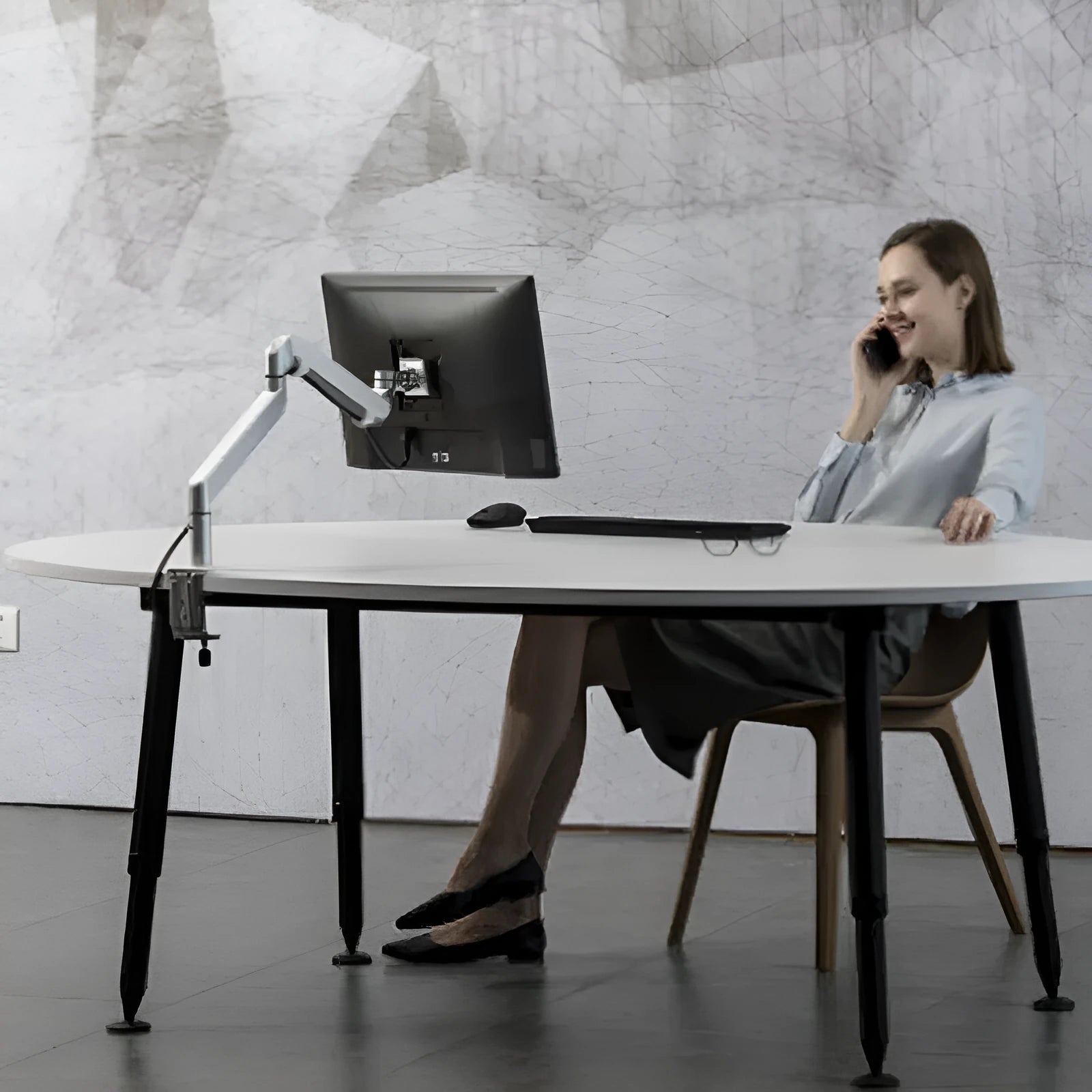 Silver aluminium laptop stand with hover design showing air gap underneath for cooling