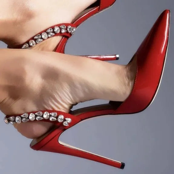 Pointed toe high heel sandals with rhinestone decoration on the side, in patent leather.
