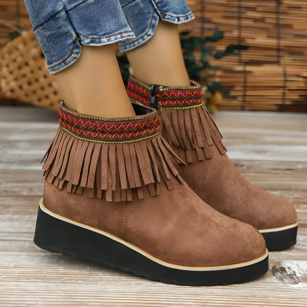 Women's wedge boots with suede upper, waterproof platform, thick rubber sole, side zip, and tassel detail
