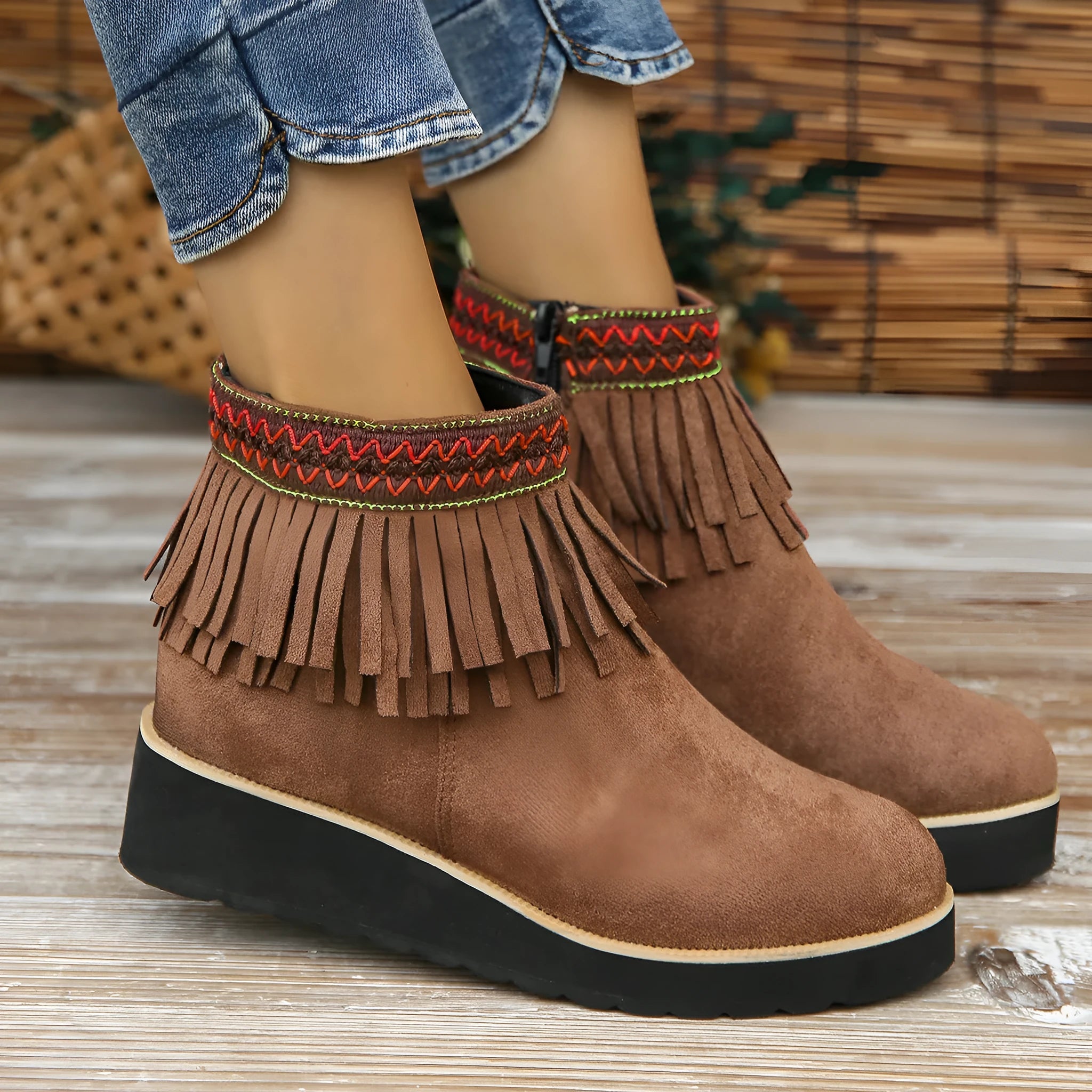 Women's wedge boots with suede upper, waterproof platform, thick rubber sole, side zip, and tassel detail