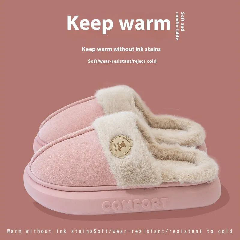 A pair of plush fleece slippers with a thick PVC sole and car stitching detail, shown in a choice of colours.