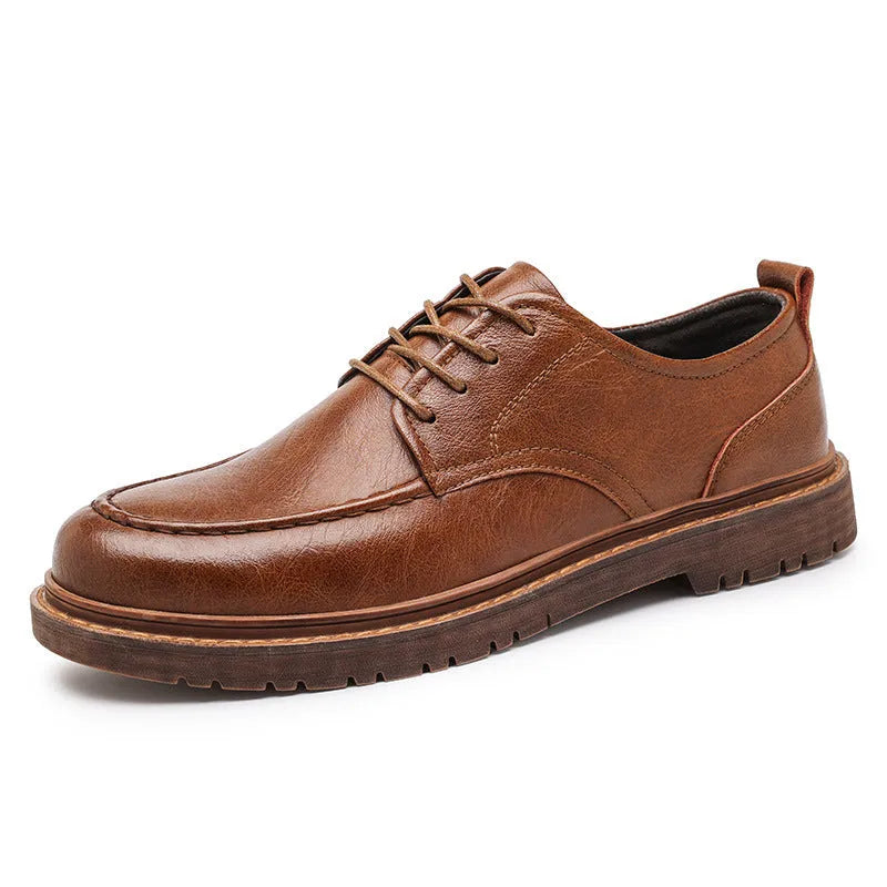 Men's black and brown casual leather shoes with round toe, low top, and flat rubber sole