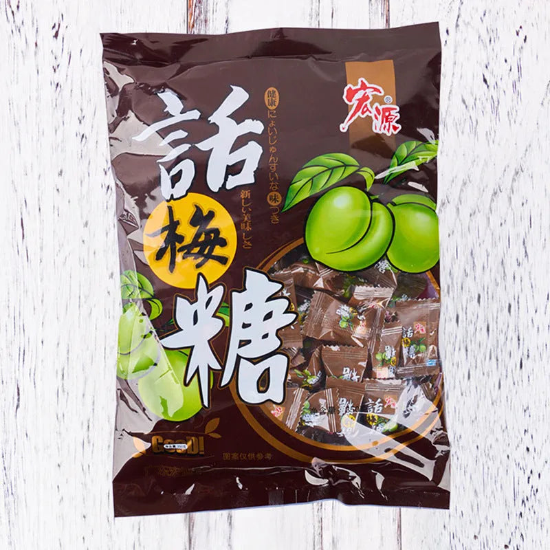Bag containing separate packs of Plum Sugar, Guava, and Tangerine Peel flavoured hard candies.
