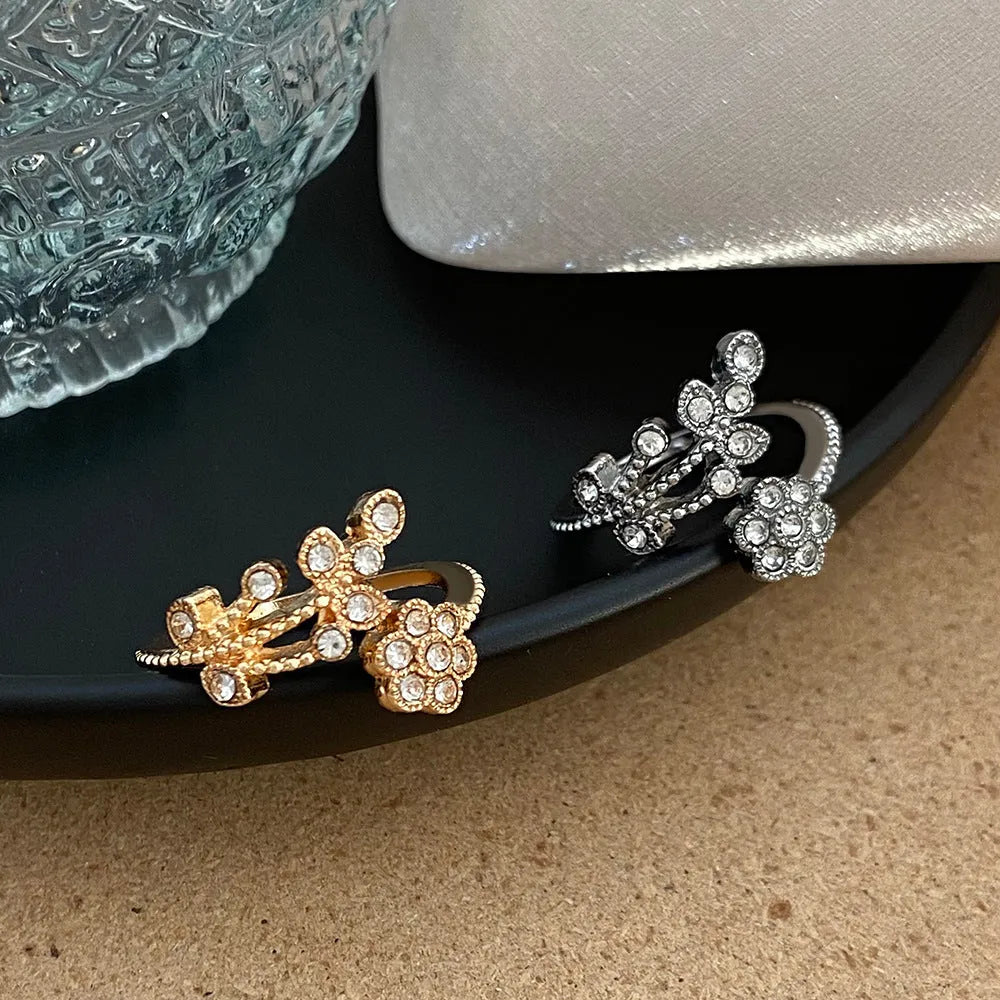 Women's copper open ring with diamond flower and leaf design in gold or white finish