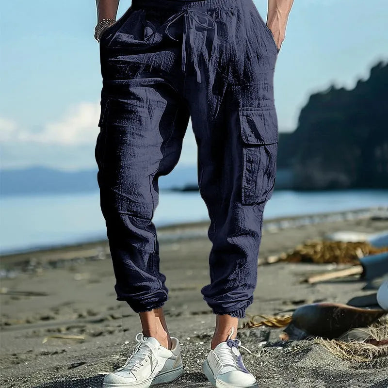 Men's linen casual trousers with ankle-tied cuffs and multiple pockets in loose fit