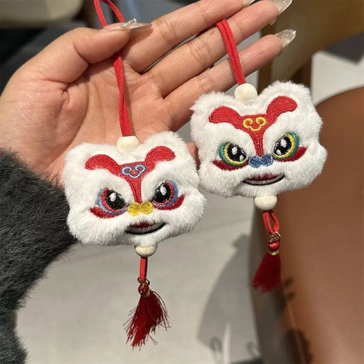 Handmade Chinese style plush lion tassel keychain ornament with star stone detail in blue colour