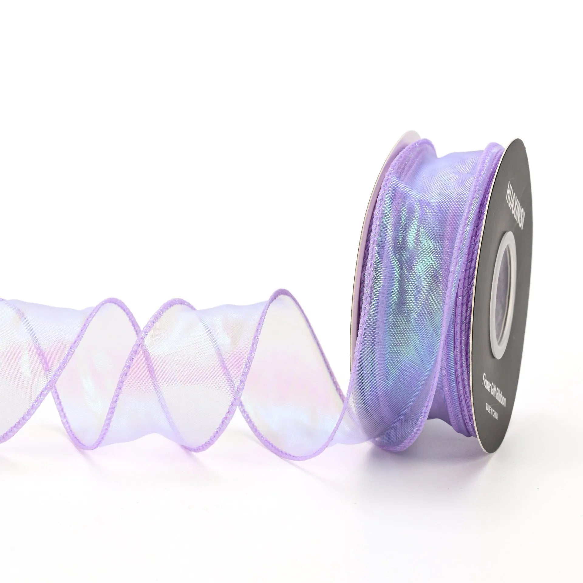 Roll of 4cm wide mesh fishtail yarn floral wave ribbon in multiple illusion colours.