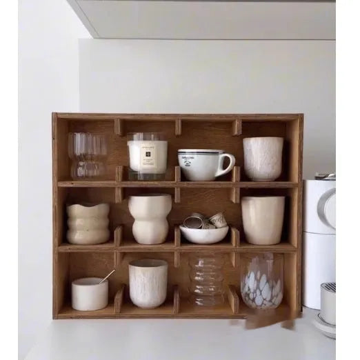 Square solid wood storage rack with multiple grid tiers in a natural birch wood finish.