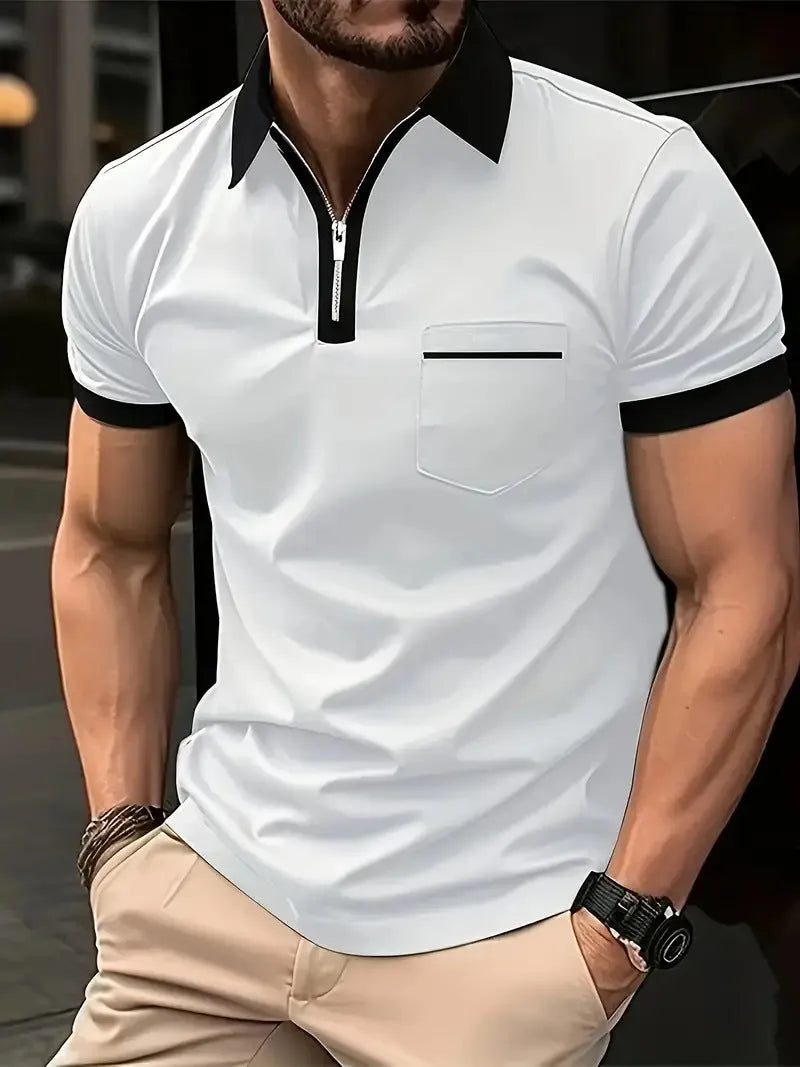 Man wearing a loose-fit casual short sleeve shirt with a chest pocket and zipper decoration.