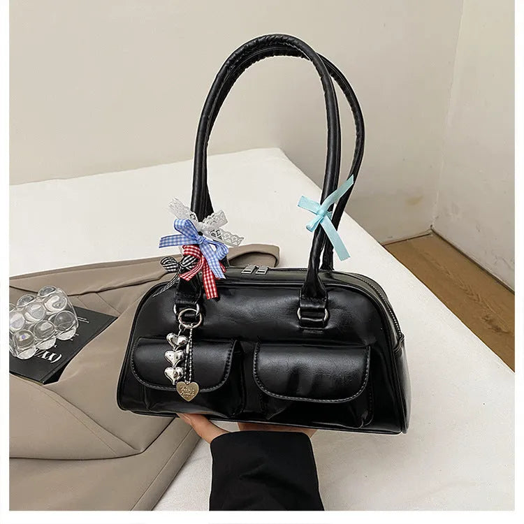 Women's retro pillow-shaped PU leather shoulder bag with flap closure and double straps