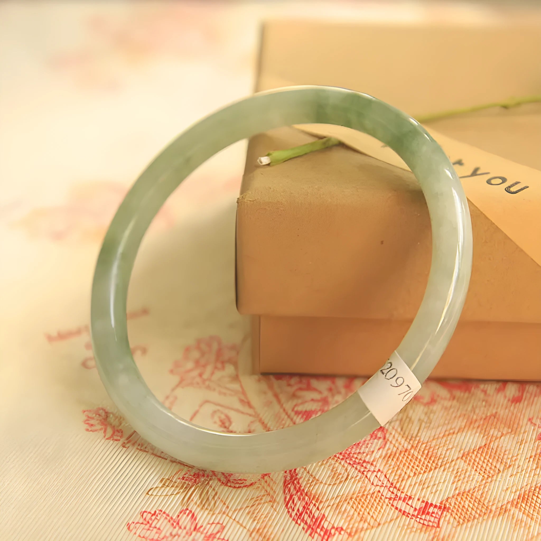 Green jade waxy geometric bracelet with Chinese style design and adjustable sizing