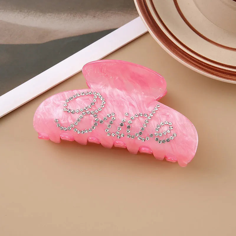 Pink and white 10cm acrylic shark hair clips with multi-diamond spot drill pattern and double-sided design