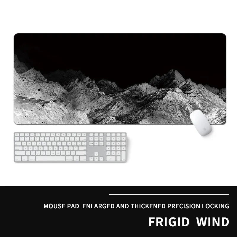 Oversized natural rubber gaming desk mat with graphical print, showing keyboard and mouse placement.