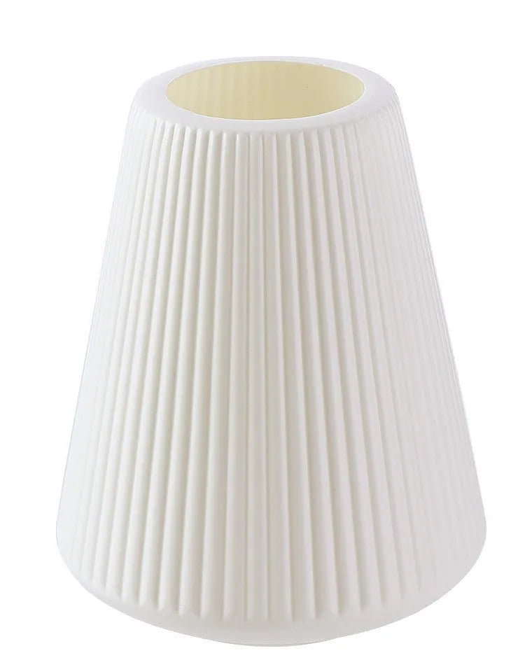 A simple style melamine plastic decorative flower vase in blue, measuring 16cm by 20cm, on a desktop.