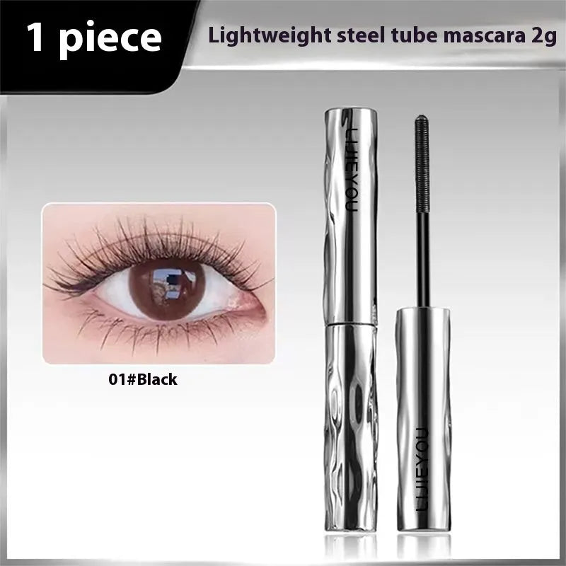 Waterproof steel tube mascara in black and brown shades shown with an eyelash curler.