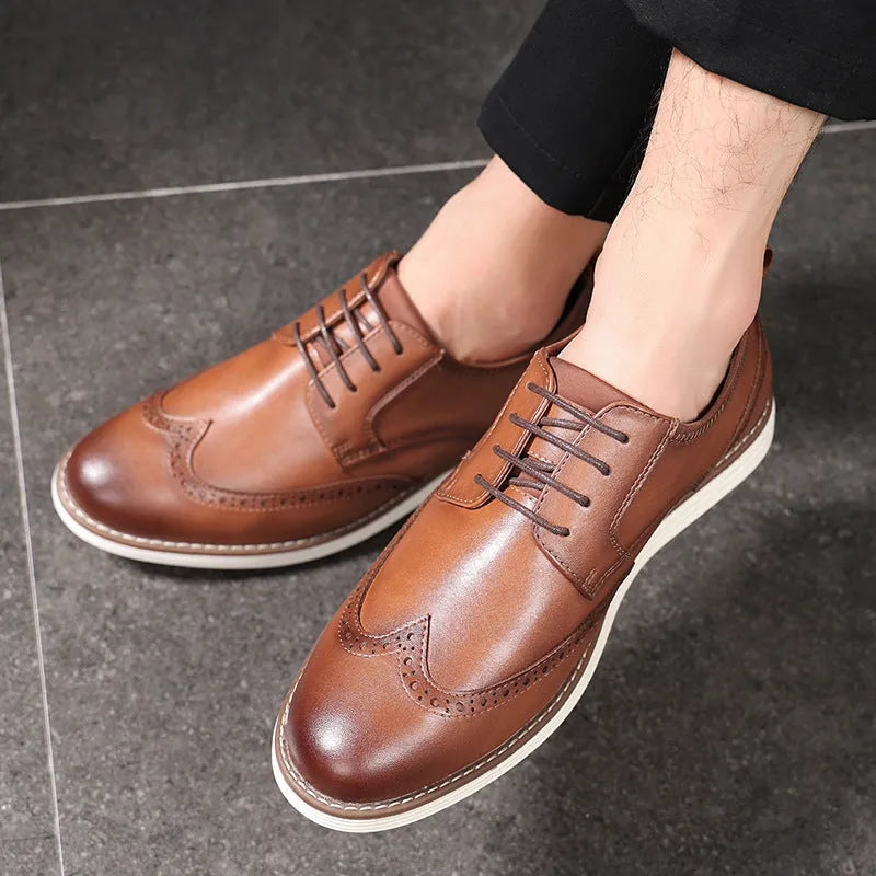 Men's black and brown slip-on business casual shoes with round toe and carving details on low-top PU upper