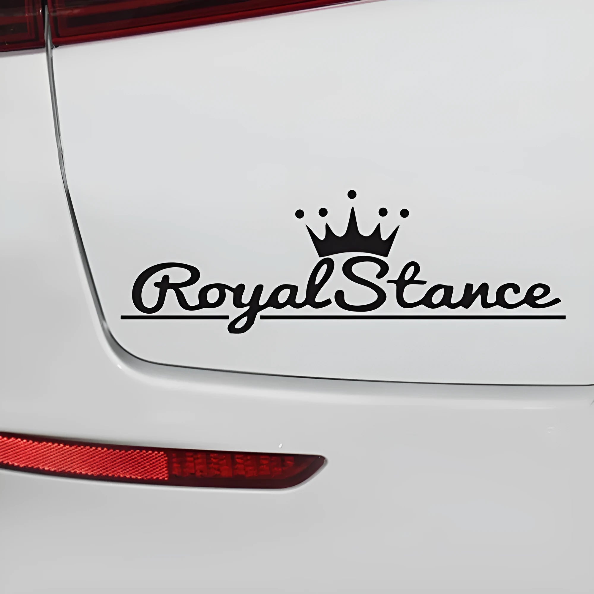 Reflective colourful vinyl crown design car sticker measuring 30 by 12 centimetres.