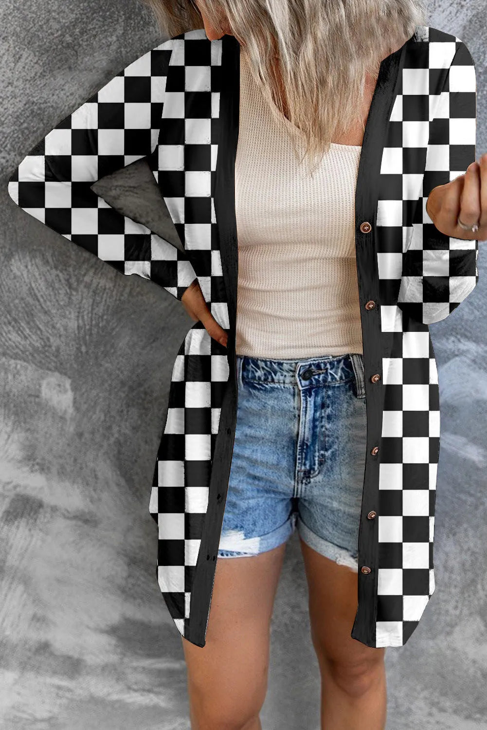 Women's long grey plaid pattern knitted cardigan coat with regular sleeves, shown on a model.