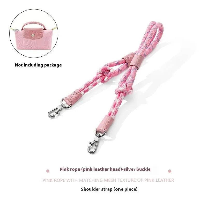 Braided nylon and cowhide leather crossbody shoulder strap with gold alloy buckle on a grey background.